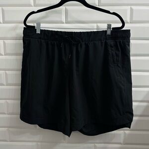 Calia by Carrie Underwood Women’s Journey Mid Rise Athletic Shorts, 8” Inseam